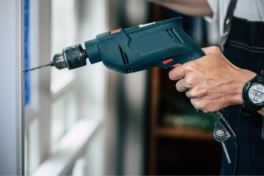 Drilling a window frame during installation